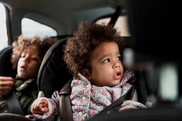 istock Young Child in A Car Seat 907666096