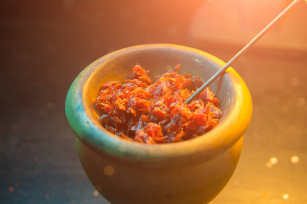 istock process of cooking shisha, hookah bowl 907666440
