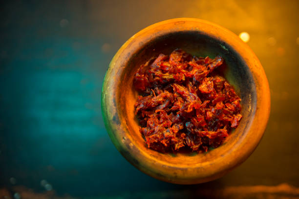istock process of cooking shisha, hookah bowl 907666444