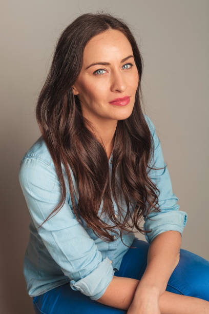 istock smiling casual woman resting 907667138