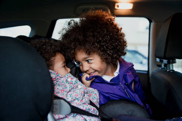 istock Young Children In Car Seats 907667146