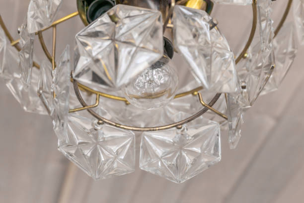 istock Chrystal chandelier closeup. Selective focus 907667190
