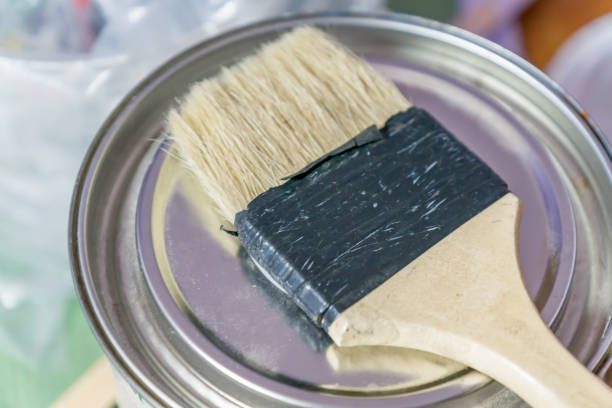 istock Paint brush on the can, closeup 907667756