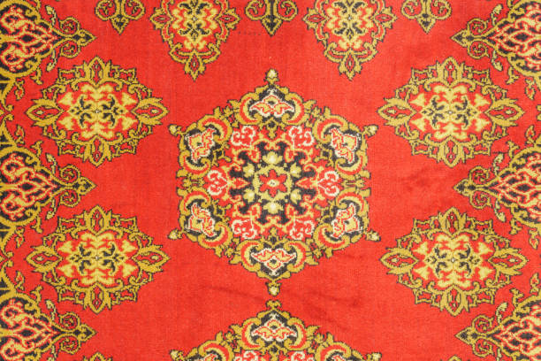 istock closeup of traditional russian carpet texture 907669940
