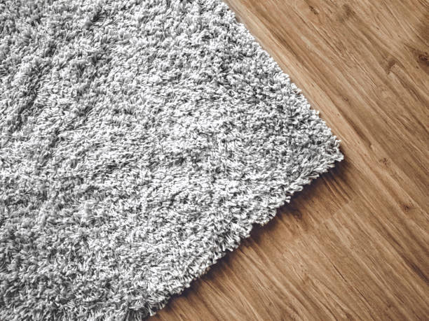 carpet on parquet stock photo
