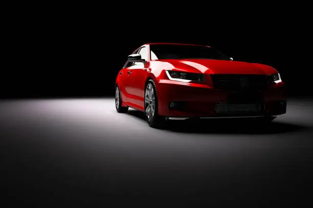 Modern new red metallic sedan car in spotlight. Generic contemporary desing, brandless. 3D rendering.
