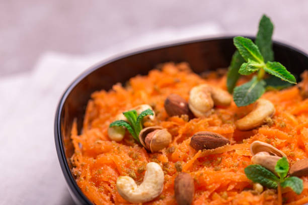 istock Indian carrot Gajar halwa. Copyspace, horizontal view, flatlay. 907676584