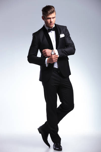 istock business man adjusts his cufflinks 907676984