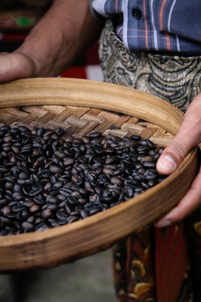 istock Coffee Beans roasted in bamboo basket 907684132