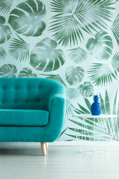 blue artificial pineapple in room - vehicle interior green sofa indoors imagens e fotografias de stock