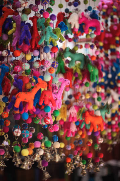 istock Asian Toy figurine mobile at market 907689906
