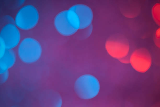 istock Defocused blue and red lights great as background 907692316