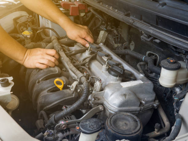 istock Car mechanic working in auto repair service 907692438