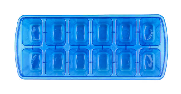 Ice cube tray Top view of blue plastic ice cube tray isolated on white sochi photos stock pictures, royalty-free photos & images