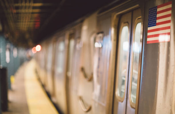 istock American Flag On Train At Railroad Station 907717528