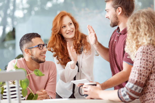 Cooperation between busineswoman and employee