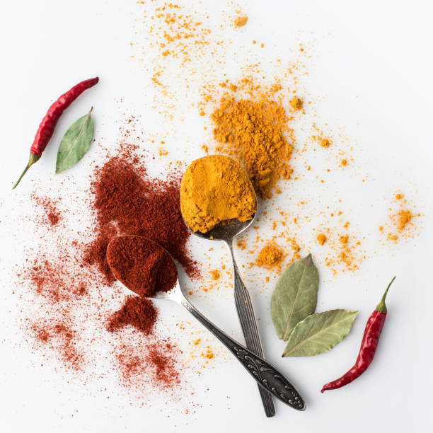 istock spoons with paprika and curry 907729188