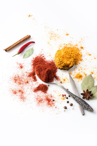 istock spoons with paprika and curry 907729414