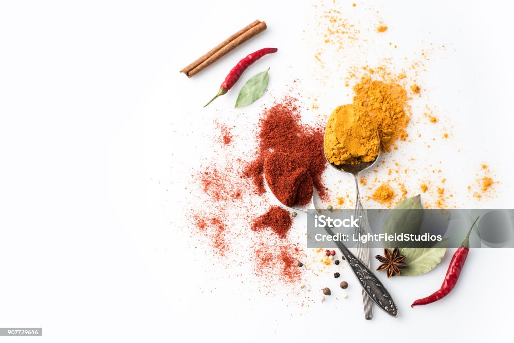 cucchiai con paprika e curry - Foto stock royalty-free di Spezia