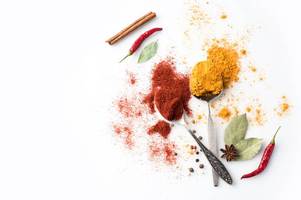 istock spoons with paprika and curry 907729646