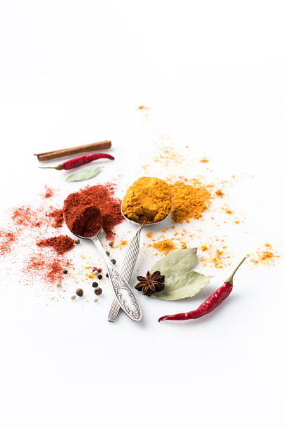 istock spoons with paprika and curry 907729796