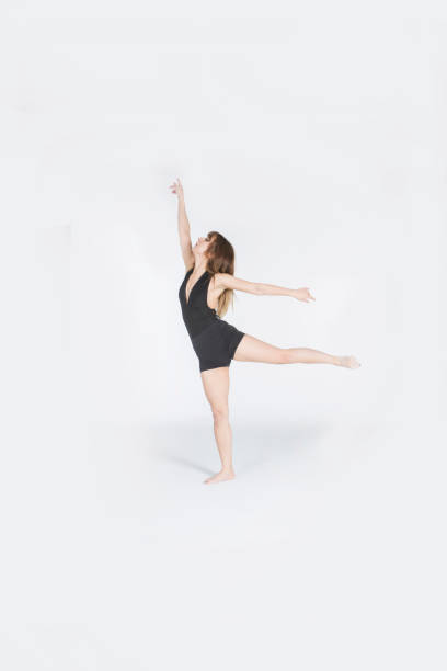 istock Young woman dancer dancing and posing in studio at istanbul turkey 907736080