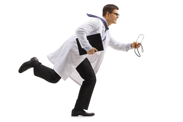 istock Doctor with a clipboard and a stethoscope running 907741112