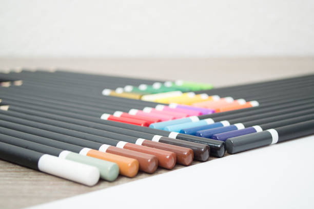 istock Color pencil on wood table 907746186