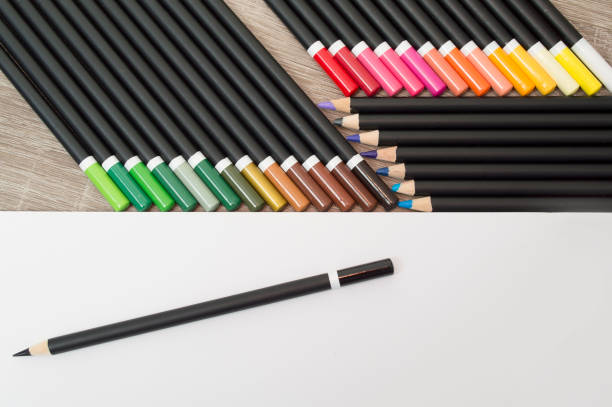 istock Color pencil on wood table 907746208