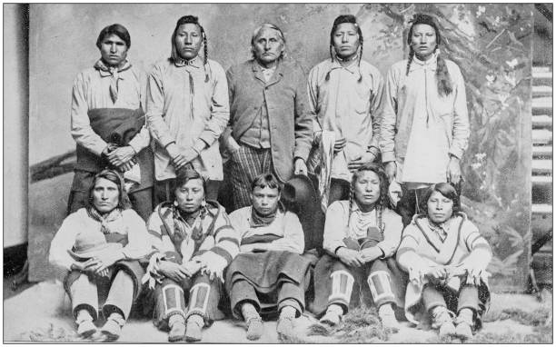 Antique photograph of people from the World: Blackfeet Indians Antique photograph of people from the World: Blackfeet Indians indigenous north american culture photos stock illustrations