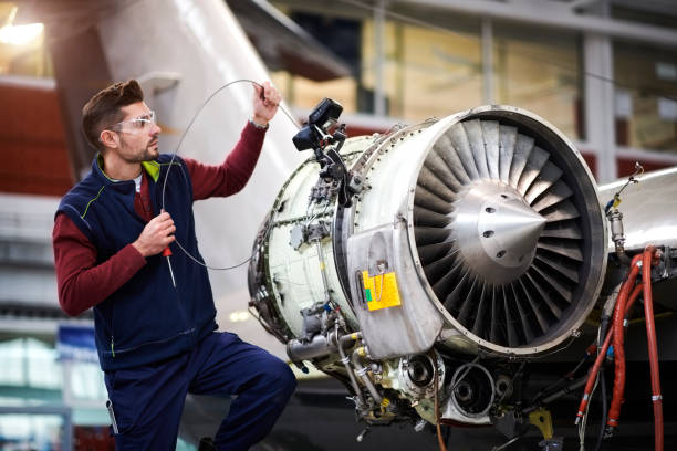 istock Aircraft mechanic in the hangar 907752632