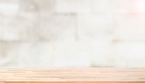 istock Wooden worktop on blur background 907769782