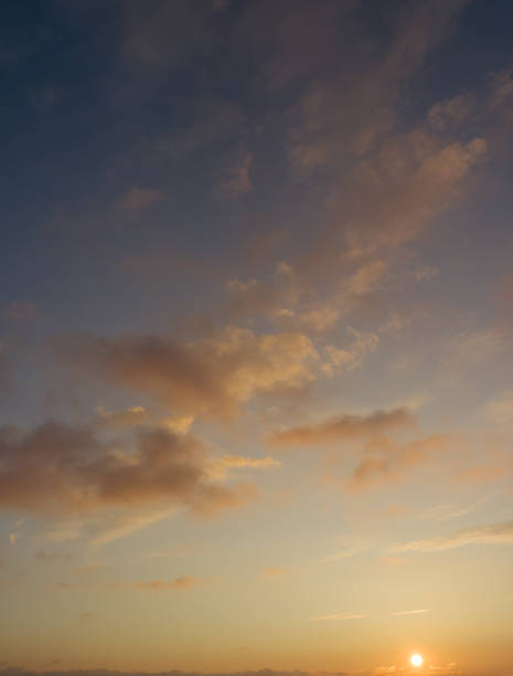 istock Beautiful dramatic sky over ocean, majestic sunset. 907776842