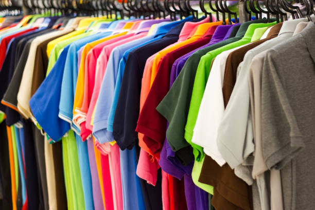 istock Man clothes multi color on hangers 907787270