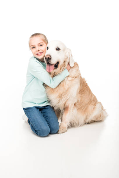 istock adorable child with dog 907787516
