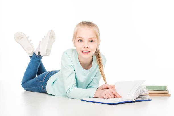 istock happy schoolgirl with books 907794412