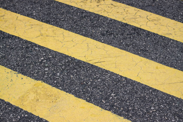 istock urban street with yellow marking 907794464