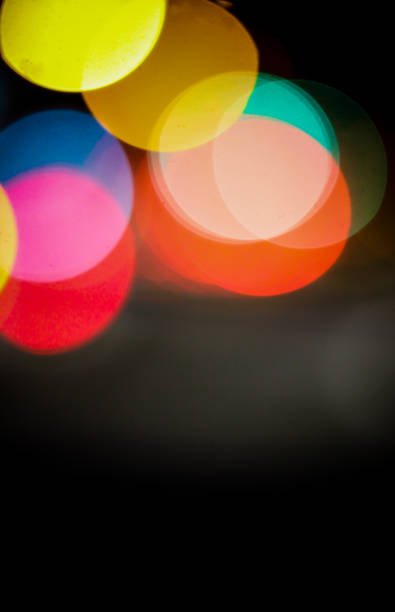 istock Colorful Bokeh on black background 907801084