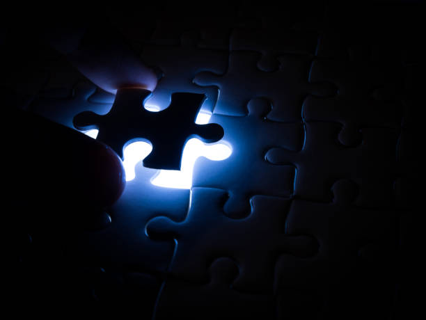 istock Missing Jigsaw puzzle piece with lighting, business concept for completing the finishing puzzle piece 907819646