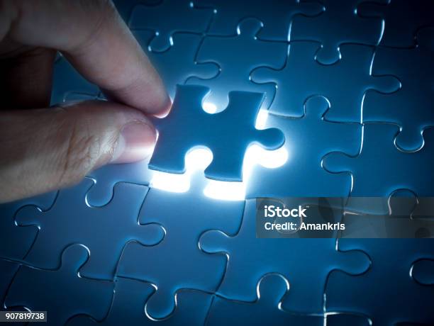 Missing Jigsaw Puzzle Piece With Lighting Business Concept For Completing The Finishing Puzzle Piece Stock Photo - Download Image Now