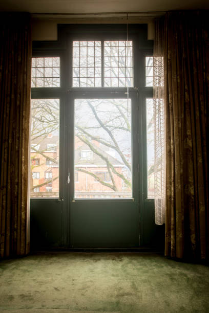 istock high vintage window in a old house 907834194