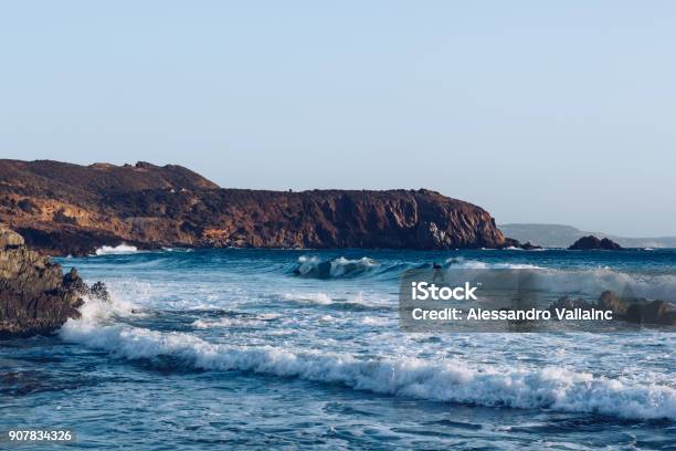 Surf Activity At The Beach Of Masua Near The Pan Di Zucchero At The West Coast Of Sardinia Ital Stock Photo - Download Image Now