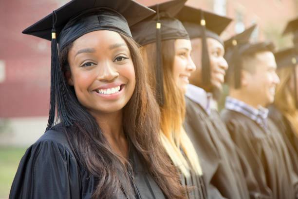 istock African descent female college student graduation on campus. 907835492