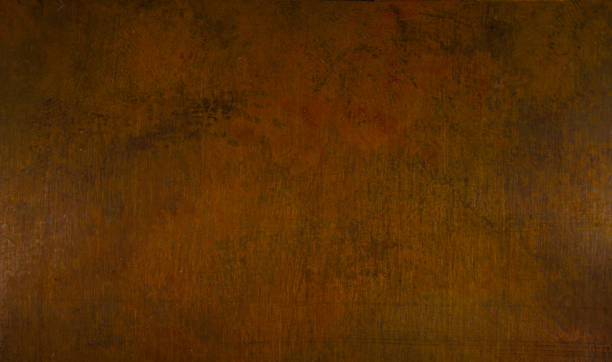 istock Aged copper plate texture, old worn metal background. 907838194