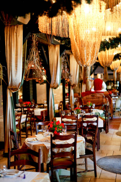 istock ROmantig setting of tables in luxury and retro styled restaurant interior 907838546