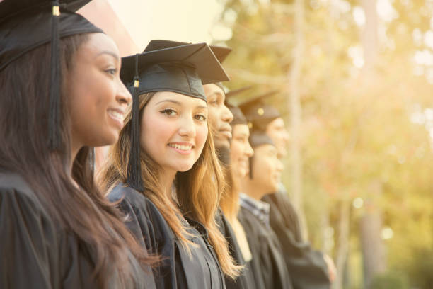 istock Latin descent female college student graduation on campus. 907838616
