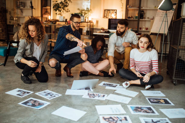 istock Designers Planning Layout On Floor Of Modern Office 907843840