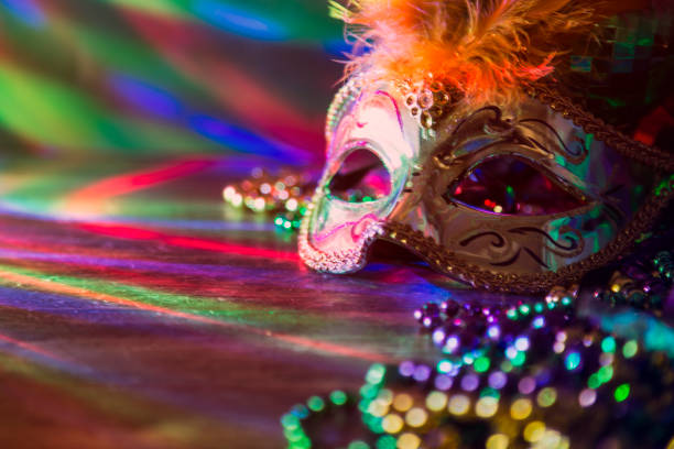istock Mardi Gras, Rio carnival mask and colorful decorations. 907843872