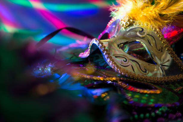 istock Mardi Gras, Rio carnival mask and colorful decorations. 907844006