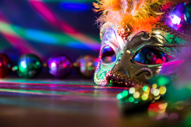istock Mardi Gras, Rio carnival mask and colorful decorations. 907844072